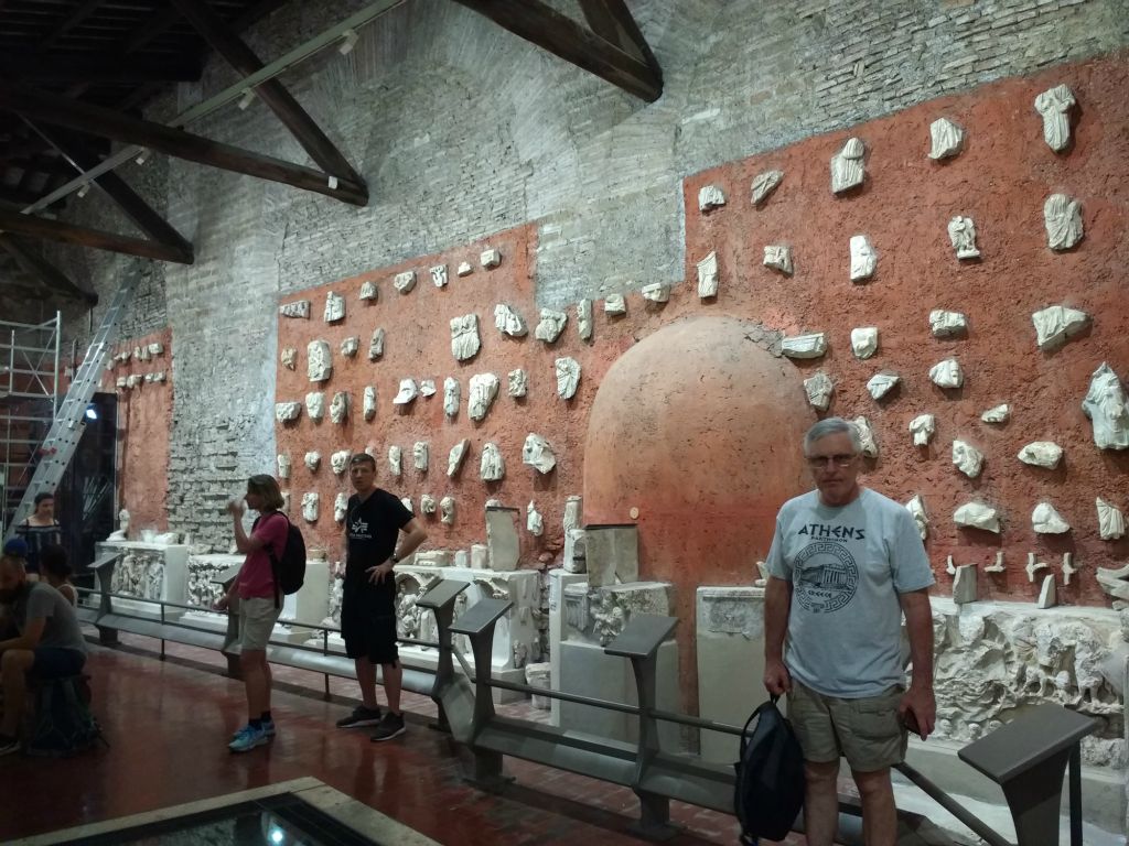 Several catacomb artifacts on display in the pre-tour waiting area
